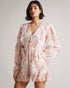IRVETE-Trousers-Ideal for sunny walks along the river or enjoying a pub lunch, IRVETE is as easy to throw on as it is captivating. Finished with ruffles, this romper is a must-have for your summer wardrobe. Ted Baker womenswear collection Romper Soft ruffle detail Fully lined Our model is 5'9" / 1.75m and wears a Ted size 1- Ted Baker Romania